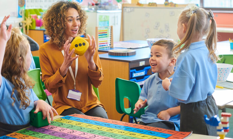 teacher with children in classroom